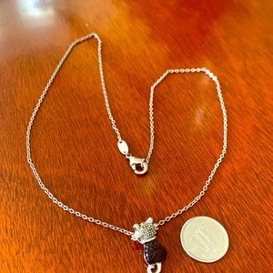 Silver necklace with a cat pendant